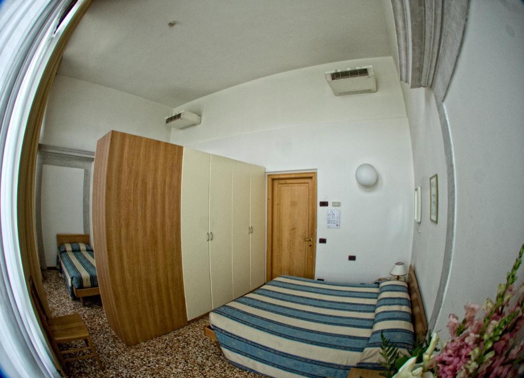 Camera Quadrupla con Bagno in Comune